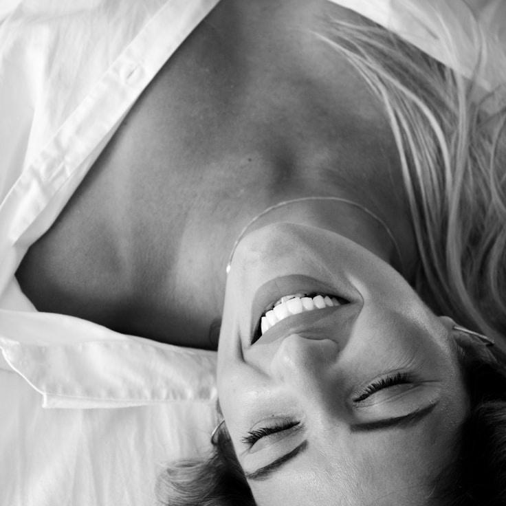 Aarav Shah, Lead Design Curator at ParcelNotionStudio, reviewing corporate floral arrangements